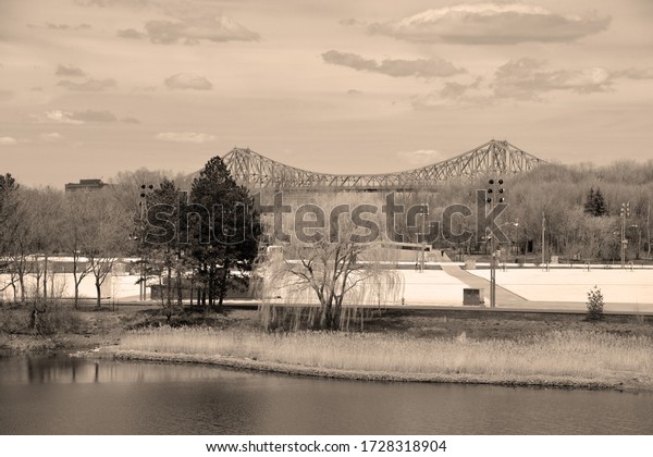 MONTREAL CANADA\
05 07 2020: The Jacques Cartier Bridge is a steel truss cantilever\
bridge crossing the Saint Lawrence River from Montreal to Longueuil\
in Montreal, Quebec,\
Canada