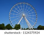 MONTREAL CANADA 06 20 18: La Grande Roue de Montreal the tallest Ferris wheel in Canada allows you to see the city and its surroundings from 60 metres in the air, the equivalent of 20-storey building