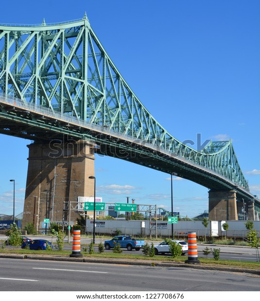 MONTREAL CANADA
09 17 2016:The Jacques Cartier Bridge is a steel truss cantilever
bridge crossing the Saint Lawrence River from Montreal to Longueuil
in Montreal, Quebec,
Canada