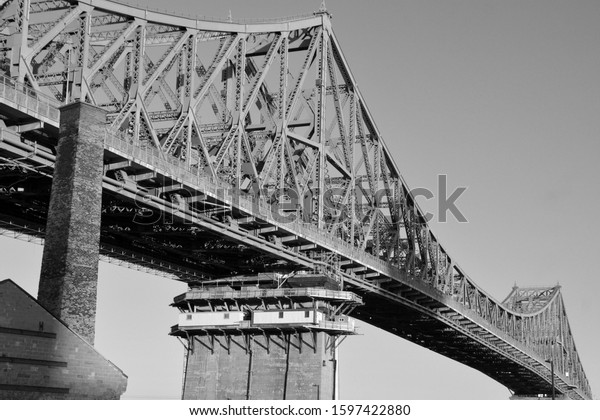 MONTREAL CANADA\
12 20 2019: The Jacques Cartier Bridge is a steel truss cantilever\
bridge crossing the Saint Lawrence River from Montreal to Longueuil\
in Montreal, Quebec,\
Canada