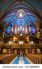 Montreal, Canada - 14 September 2017: Interior of the Notre-Dame Basilica in the historic district of Old Montreal, showing the ornate gothic organ