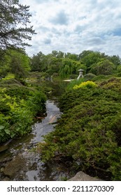 Montreal, Canada -2022: Japanese Garden At Montreal Botanical Garden. Strolling Garden With Stone Lantern, Stream, Pond And Native Canadian Plants Arranged With Japanese Aesthetics And Ideas.  