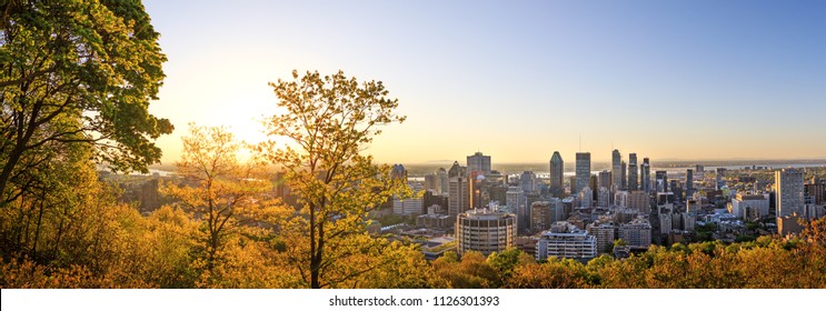 Montreal, Canada, 21 May 2018. Beautiful Golden Sunrise Over The Montreal City. Amazing Panorama Of Montreal Downtown Skyline In The Morning Hours. Golden Sun Light View From Mont-Royal Park.