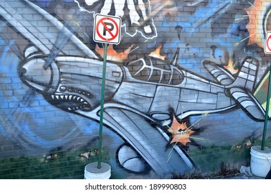 MONTREAL CANADA APRIL 07: Street art war on april 07 2014 in Montreal Canada. Montreal. is the perfect place to walk in the back alleys and abandoned areas, looking for fresh air and street art. - Shutterstock ID 189990803