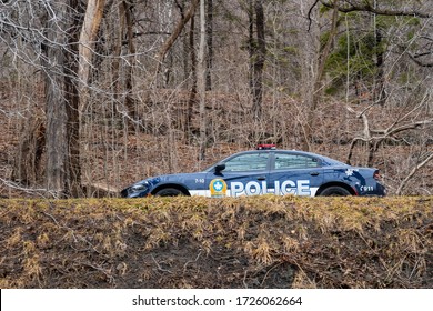 Montreal, Canada - April 2014: Police Car Patrolling Inside Mount Royal Park During The Covid-19 Crisis