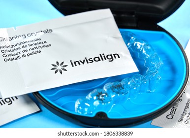 Montreal, Canada - August 28, 2020: Align aligners with cleaning crystals in box. Invisalign are plastic clear aligners know as invisible orthodontics, customized to fit jaw used for bite correction