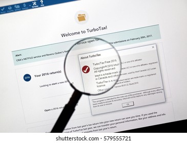 MONTREAL, CANADA - FEBRUARY 12, 2017 - Turbotax Software App Under Magnifying Glass. Turbotax Is An Application For Accurate Tax Calculations.