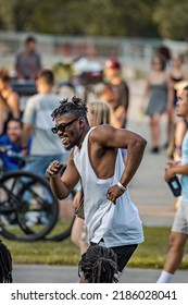 MONTREAL, CANADA - July 2022: Black Man Dancing At Tam-Tams  Weekly Free Festival Around The George-Étienne Cartier Monument In Mount Royal Park In Montreal, Quebec, Canada