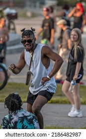 MONTREAL, CANADA - July 2022: Black Man Dancing At Tam-Tams  Weekly Free Festival Around The George-Étienne Cartier Monument In Mount Royal Park In Montreal, Quebec, Canada