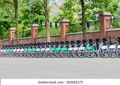 Montreal, Canada - July 25, 2014: Row Of Many Parked Public Bicycles With Telus Signs