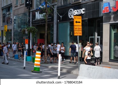 Montreal, Canada - July 25th 2020 Line Of People To Cannabis Store (SQDC) On Saint Catherine Street In Montreal  