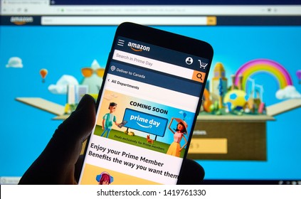 MONTREAL, CANADA - JUNE 9, 2019 : Amazon prime day page and logo on android cell phone over Amazon home page. Amazon Prime Day is the retailer's big members-only summer sale in month of July each year