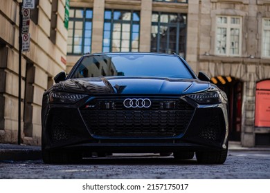 MONTREAL, CANADA - Mar 23, 2022: A black Audi RS6 automobile parked in downtown old Montreal, Canada