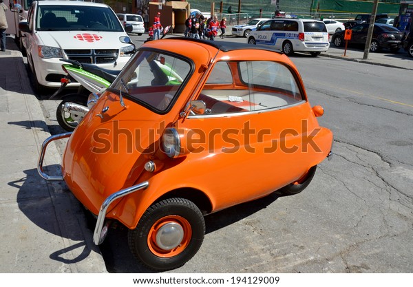 MONTREAL CANADA MAY 19: BMW Isetta was the world\'s\
first mass-production 3-Litres car. Was the top-selling\
single-cylinder car in the world, with 161,728 units sold. On may\
18 2014 in Montreal\
Canada
