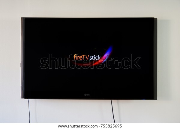 MONTREAL, CANADA - NOVEMBER 15, 2017: Amazon Fire TV Stick on LG TV. Amazon Fire TV Stick is a low cost version in a HDMI-stick format of Amazon Fire TV, Android based.