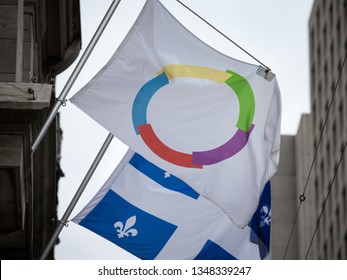 MONTREAL, CANADA - NOVEMBER 8, 2018: Organisation Internationale De La Francophonie Flag Next To The Flag Of Quebec In Montreal. It Is The Francophony Organization Coordinating French Speaking 