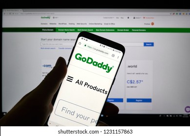MONTREAL, CANADA - OCTOBER 3, 2018 : GoDaddy page, logo and app on a S8 Samsung cell phone. GoDaddy is an American publicly traded Internet domain registrar company.