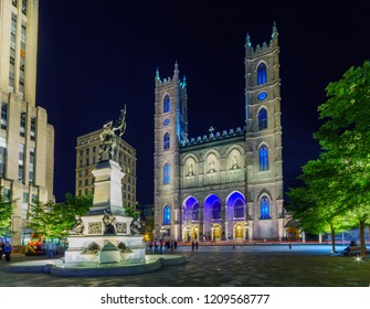 Montreal, Canada - September 07, 2018: Night View Of The Notre-Dame Basilica And Place DArmes Square, With Visitors, In Montreal, Quebec, Canada