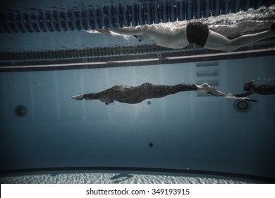 MONTREAL, CIRCA JUNE 2014 - Two Hot Spring Days of Freediving Competition at Jean-Drapeau 50m Outdoor Olympic Pool. Freediver Dynamic with Monofin Performance from Underwater