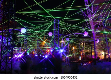 Montreal Festival Of Lights. Colorful Illuminated Silhouettes In The Night. Lighting Installations. Winter Festival Of Arts. Outdoor Family Activities. Entertainment District.

