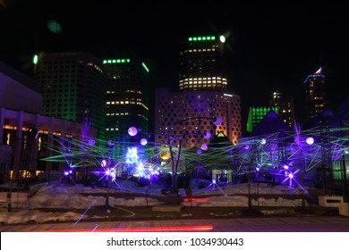 Montreal Festival Of Lights. Colorful Illuminated Silhouettes In The Night. Lighting Installations. Winter Festival Of Arts. Outdoor Family Activities. Entertainment District.

