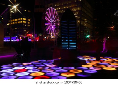 Montreal Festival Of Lights. Colorful Illuminated Silhouettes In The Night. Lighting Installations. Winter Festival Of Arts. Outdoor Family Activities. Entertainment District.

