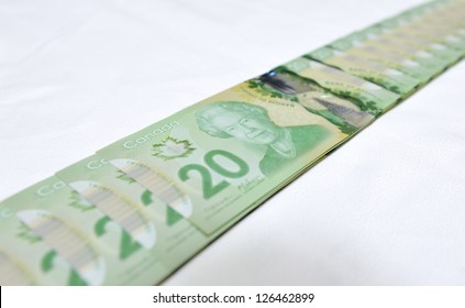 MONTREAL - NOVEMBER 19: The New Polymer Twenty Dollar Bill, Which Is The Most Widely Used Bank Note In The Country, Is Pictured On November 19, 2012 In Montreal, Quebec, Canada.