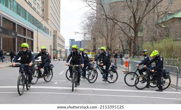 MONTREAL OC\
CANADA 05 03 2022: Bicycle squad of Service de police de la Ville\
de Montreal (SPVM) (French for Montreal Police Service) is the\
police force for the city of Montreal\
