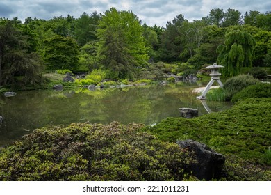  Montreal, QC, Canada -2022: Japanese Garden At Montreal Botanical Garden. Strolling Garden With Stone Lantern, Stream, Pond And Native Canadian Plants Arranged With Japanese Aesthetics And Ideals. 