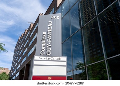 Montreal, QC, Canada - September 4, 2021: Sign Of  Guy-Favreau Complex In Montreal, QC, Canada. Guy-Favreau Complex Is A Building Complex Containing Canadian Federal Government Offices. 