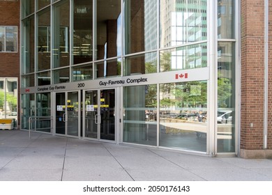 Montreal, QC, Canada - September 4, 2021: Entrance To Guy-Favreau Complex In Montreal, QC, Canada. Guy-Favreau Complex Is A Building Complex Containing Canadian Federal Government Offices. 