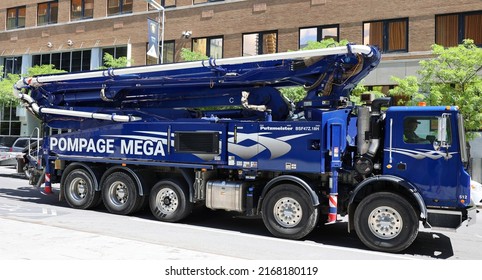 MONTREAL QUEBEC CANADA 04 06 2022: Pumping MEGA Truck And Its Wide Range Of Concrete Pumps Designed For Residential, Commercial, Institutional, Industrial, Civil Engineering And Agriculture Sectors