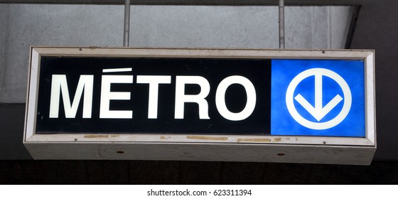 MONTREAL QUEBEC CANADA 04 04 2017: Sign Of Montreal Metro Is A Rubber-tired, Underground Rapid Transit System And The Main Form Of Public Transport In The City Of Montreal Transit Corporation (STM)