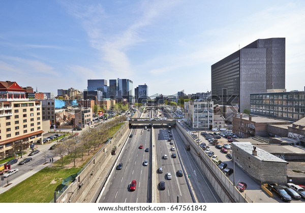 MONTREAL, QUEBEC, CANADA - 17 MAY 2017:\
Ville-Marie highway with lot of traffic in Dowtown Montreal,\
Canada. Shot from above a terraced\
building