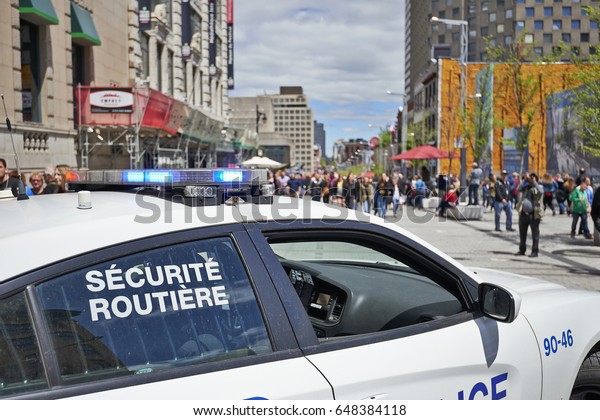 MONTREAL,\
QUEBEC, CANADA - 19 MAY 2017: Security police car parked in \
Montreal streets during 375th birthday\
bash