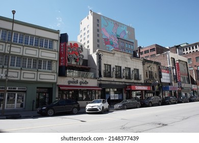 Montreal, Quebec, Canada - April 12, 2022: Businesses and streetscape of Peel Street in downtown Montreal