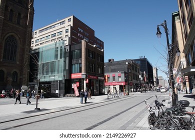 Montreal, Quebec, Canada - April 12, 2022: Streetscape of Rue Sainte-Catherine