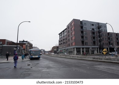 Montreal, Quebec, Canada - April 14, 2022: Streetscape of Rue Jean-Talon in the Little Italy neighborhood