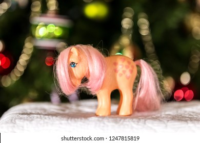 Montreal, Quebec, Canada December 2018: First Generation Peachy My Little Pony Toy In Front Of Christmas Tree.