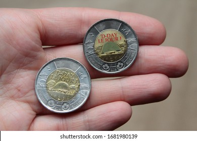 Montreal, Quebec / Canada - January 15 2020: Colored Bimetallic Coins, Canadian Dollars (toonie). D-Day Commemorative Design Honoring Heroes Of Operation Neptune (Normandy Landings) Of World War II.