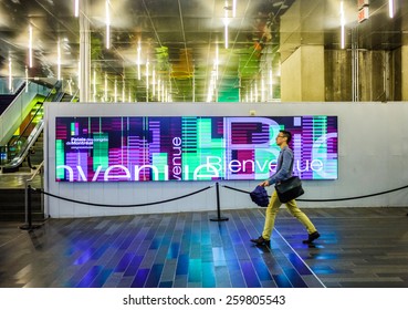 - Montreal Quebec, Canada. July 28th 2014 At The Palais Des Congres De Montreal. Indoor Welcome Sign Saying Bienvenue In French From The North Entrance.