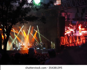 Montreal Quebec Canada -  July 5 2014 Shantel & Bucovina Club Orkestar From Germany On Stage In Concert Festival Jazz International Under Colorful Spotlight Projection Screen