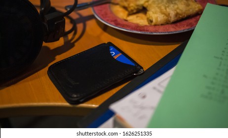 Montreal, Quebec / Canada - Octobre 31 2019: Opus Public Transit Card In Small Black Wallet On Wooden Desk