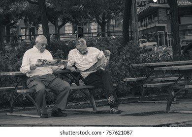 Montreal Quebec Canada.October 2017.two Male Tourists Reading Map At Old Port Montreal Quebec