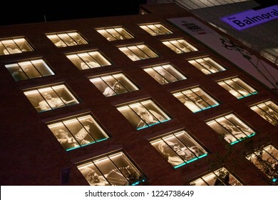 Montreal, Quebec - July 5, 2017 - Wide View Of Famous Jazz Musicians Set Into The Windows Of A Building At International Jazz Festival In Downtown Montreal, In The Evening.