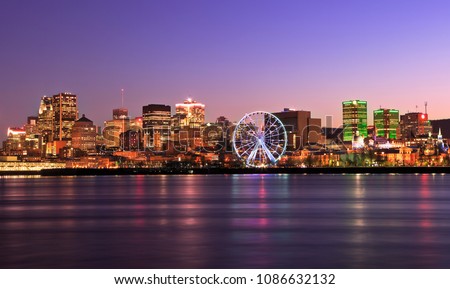 Montreal skyline at dusk and Saint Lawrence River in Quebec, Canada