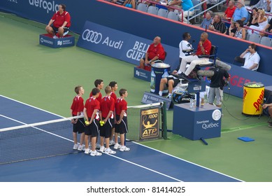 MONTREAL,CANADA - AUGUST 12: Montreal's balls boys at the semi-final of Montreal Rogers Cup August 12, 2009 in Montreal, Canada. Ball boys were first introduced at Wimbledon in 1920.