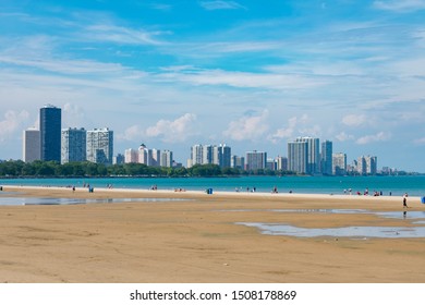 Montrose Beach In Uptown Chicago During The Summer With The Edgewater Skyline