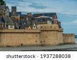 Mont-Saint-Michel, Normandy, France: View of the ramparts and a part of this historic fortified town located on a tidal island - a famous French landmark.