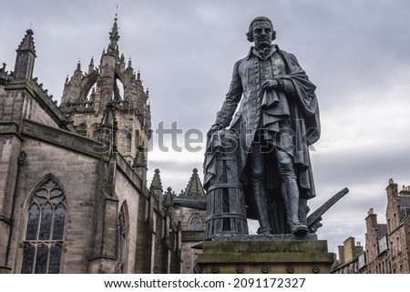 Monument to the Adam Smith in front of Saint Giles cathedral in the Old Town of Edinburgh city, Scotland, UK